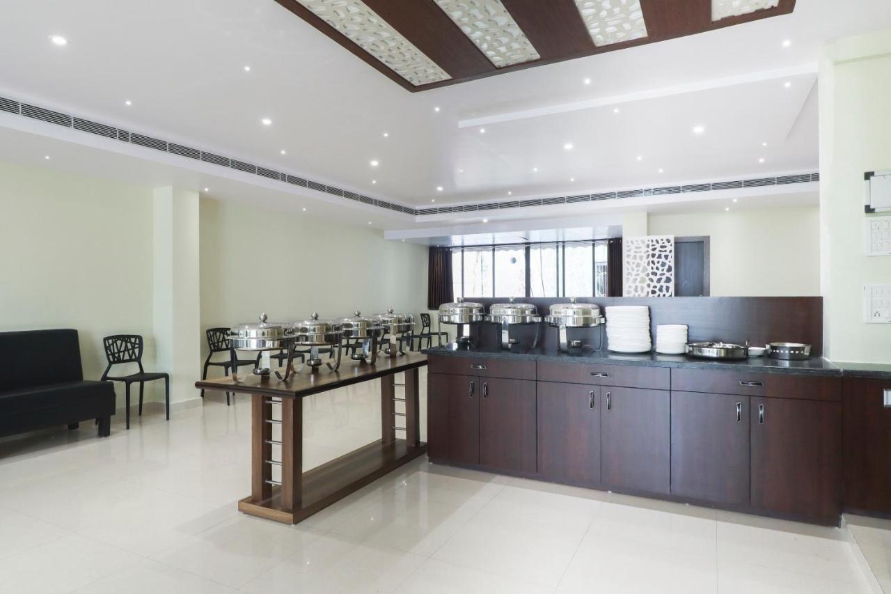 Capital O Hotel 7Th Heaven Jamshedpur Exterior foto